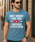 Man wearing Funny DIY Mechanic T Shirt For Men I Watched A YouTube Video Design Indigo Blue Casual Workwear Tee in urban setting