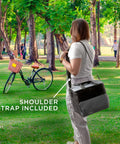 Portable Electric Cooler Bag Keeps Your Drinks Straight Up Frosty On Weekend Road Trips 15 Liter Soft Sided with shoulder strap in park.