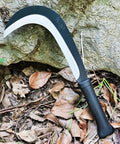 Beast Mode Machete Sickle For Weed Removal And Grass Clearing With Magnetic Long Handle and carbon steel blade on forest floor