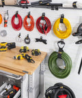 Garage Organization Value Pack With Assorted Storage Straps For Cords And Hoses Cable Management Essentials on pegboard wall
