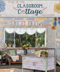 Classroom Cottage-themed room setup with decor, flower accents, and signage featuring kindness messages in a cozy learning environment.