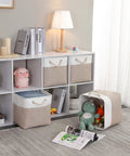 Slick Cube Storage Bins Ditch The Mess Fabric Baskets For Closets And Shelves Foldable Organizer Containers A Clutch Home Stash Box In Light Khaki 13 Inch 3 Pack on display with toys and books.