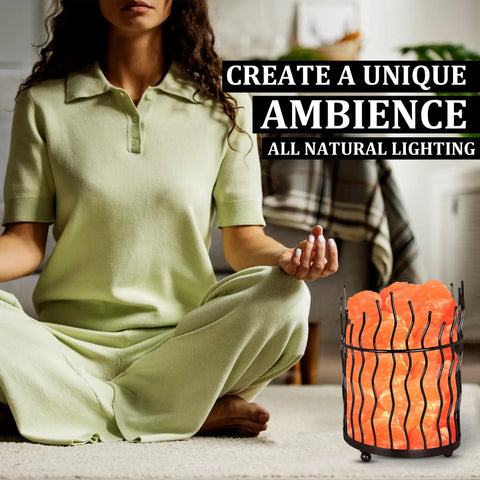 Person meditating near Pink Himalayan Salt Lamp With Dimmer Switch In A Tall Round Metal Basket, 8 To 10 Lbs