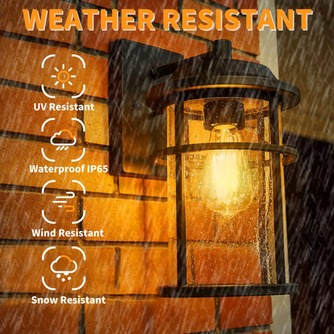 Durable Outdoor Wall Lights For House Exterior Waterproof Sconce With Seeded Glass Shade Anti Rust Black Finish shown in rain