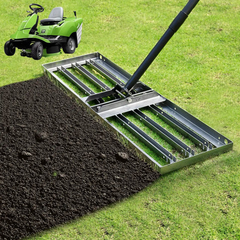 Beast Pro Grade Lawn Leveling Rake With 70.5 Inch Adjustable Handle And 34.1 By 9.4 Inch Head on grass with attached lawn tractor.