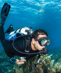 Navigator Lite Back-Inflated Scuba BCD With Balanced Power Inflator For Recreational Diving being used underwater