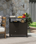 Wicker Outdoor Storage Cabinet With Rattan Bar Table And Two Doors, Open Shelf, 46.6 Gallon Enclosed Storage, Weatherproof Poolside Buffet Console With A Metal Slatted Countertop For Patio Backyard Dark Coffee Finish in an outdoor setting.