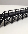 Top Shelf 3D Printed Railway Maintenance Platform For Station Engine House HO OO Scale Model Train Layout Ready To Paint Accessory With Knockout Detail showing black PLA service platform with steps.