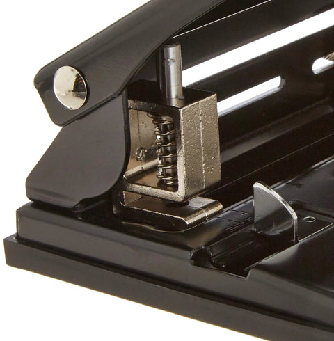 Close-up of Heavy Duty Adjustable Nine Thirty Second Inch Hole Punch With Three Heads Two Or Three Hole Settings Center Guide