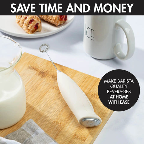 Powerful Handheld Milk Frother For Lattes And Cappuccinos Battery Powered Mini Drink Mixer Perfect For Home Barista Use Creamy Foam In Seconds Great For Matcha And More displayed on wooden board with coffee items.