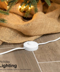 Extension Cord With Footswitch And 3 Outlets, On Off Switch, White, Shown Beneath Holiday Decor With Lights, 9 Foot Power Cord