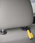 Resqme emergency escape tool, yellow, installed on car seat back; 2-in-1 seatbelt cutter and window breaker
