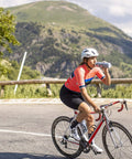 Rock Solid Double Wall Insulated Cycling Water Bottle Keeps Drinks Ice Cold On Long Rides used by cyclist on bike in classic navy.