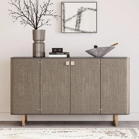 Taupe Metallic Grasscloth Peel And Stick Wallpaper Roll Featuring Faux Woven Texture With Subtle Shimmer on a stylish cabinet.
