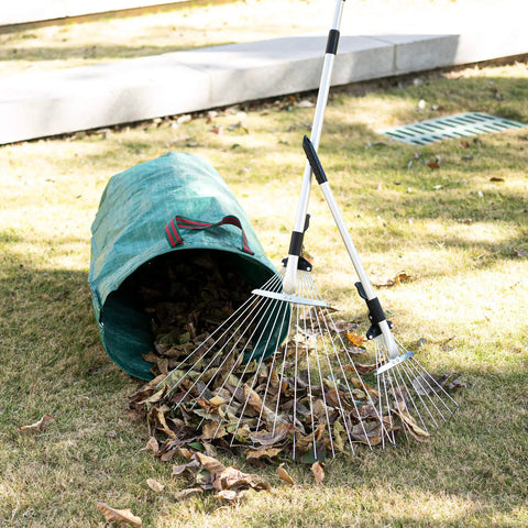 Two Pack Adjustable Yard Rake Set With 63-Inch 15-Tine Big Rake And 30-Inch 9-Tine Small Rake, extendable handles in use on lawn