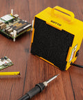 Solder Smoke Absorber And Fume Extractor For Soldering Station DIY Working Fan With Zero Point Four Inch Activated Carbon Filter Keeps Your Shop Fresh And Odor Free Portable Yellow Unit on workbench.