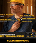 Man wearing wearable clip on Bluetooth speaker for job sites, water resistant portable speaker with built in mic and rugged yellow design.