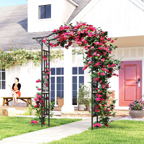 Garden Arch Trellis With Extended Top 7.5Ft Black PE Coated Steel Arbor For Climbing Plants And Vines in a garden setting
