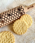 Mini Embossed Rolling Pin Set Of 3 With Bees, Meadow And Forest Patterns For Cookies, Play Dough And Clay, showing bee pattern on cookies.