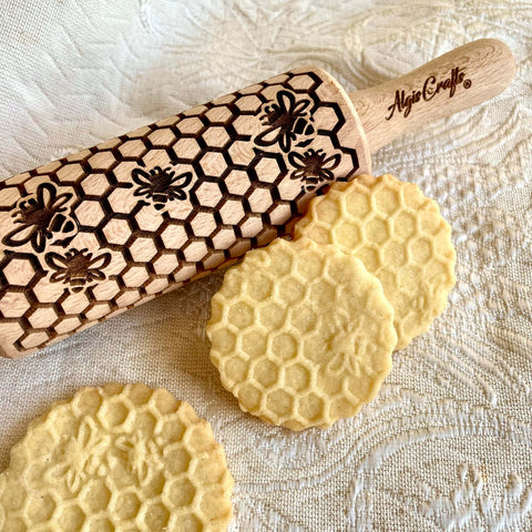 Mini Embossed Rolling Pin Set Of 3 With Bees, Meadow And Forest Patterns For Cookies, Play Dough And Clay, showing bee pattern on cookies.