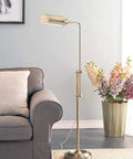 Antique Brass Floor Lamp With Adjustable Height And Swivel Head, Classic Mid Century Modern Vibe, near grey sofa with flowers
