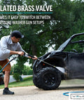 Man using pressure washer on ATV with Italian DN10 Brass Plated Ball Valve For Pressure Washers And Industrial Use.