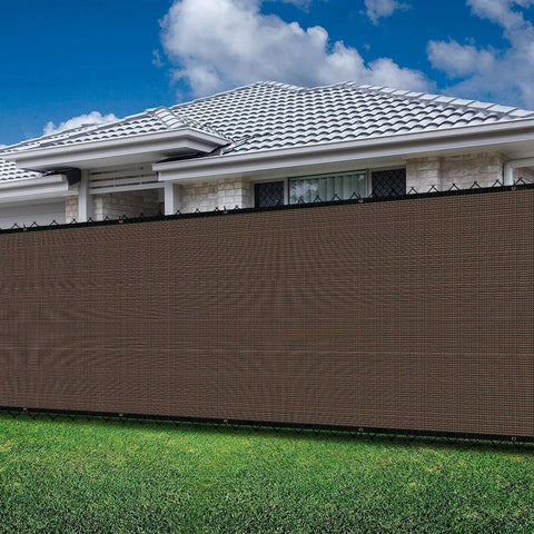 Privacy Fence Screen 4x25 Ft Outdoor Windscreen Cover 90 Percent Blockage Heavy Duty Mesh Shade Cloth with Grommets installed on backyard fence