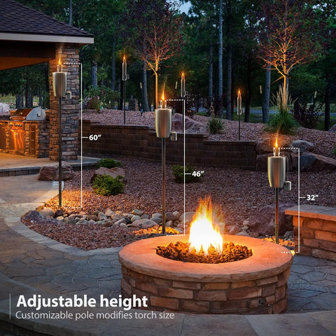 Stainless Steel Outdoor Torches Set Of 2 5 Ft Citronella Oil Lamps with varying heights around a backyard fire pit
