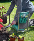 Gardener using 2 In 1 Portable Garden Kneeler Bench And Seat Stool With Tool Bag Accessory, Folding Steel Frame With EVA Foam Cushions in garden