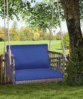Cozy Navy Rattan Patio Swing Chair For One With Cushions, Heavy Duty Metal Frame And Sturdy Hanging Ropes in outdoor setting