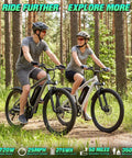 Adult Electric Bike 26 Inch Commuter With 7 Speed Gears And A Smooth 25 MPH Cruise Powered By A Heavy Hitting 720W Peak Motor Paired With A Swappable 375Wh Battery Built For A Rock Solid 50 Mile Range On City Streets Or Dirt Trails In White, showcased during outdoor riding.