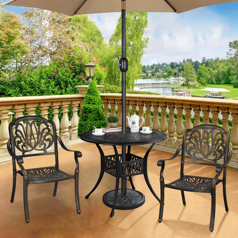 Heavy Duty Bronze 18 Inch Patio Umbrella Base All Weather Resin Stand 26 Lb under table with decorative chairs on balcony