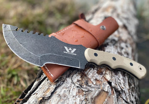 Tracker Knife Outdoor Fixed Blade Bushcraft Camp Knife with sheath on log showing G10 grip and 65Mn steel blade for wilderness survival.