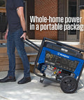 Man moving Gas Powered Portable Backup Generator With Remote Start And Auto Choke, 12500 Peak Watts And 9500 Running Watts