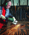 Worker using 9-Inch Angle Grinder With Lock-On Trigger, 6600 RPM, 15 Amp, W24-230 MVT for metalwork, sparks flying