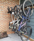 Beefy Four Bike Wall Mount Storage Rack built from solid steel with heavy duty garage grade construction holds up to 200 lbs across four bikes.