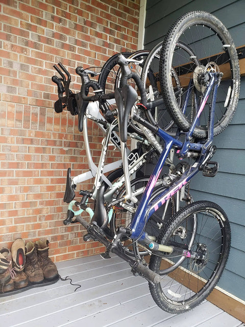 Beefy Four Bike Wall Mount Storage Rack built from solid steel with heavy duty garage grade construction holds up to 200 lbs across four bikes.