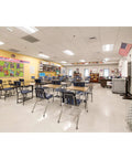 Ceiling of classroom showing Dual Tech Ultrasonic And PIR Ceiling Motion Sensor With 1000 Sq Ft Coverage