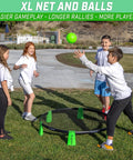 Slammo XL Extra Large Round Net Game For Beginners setup with children playing, featuring net, balls, at outdoor gathering.