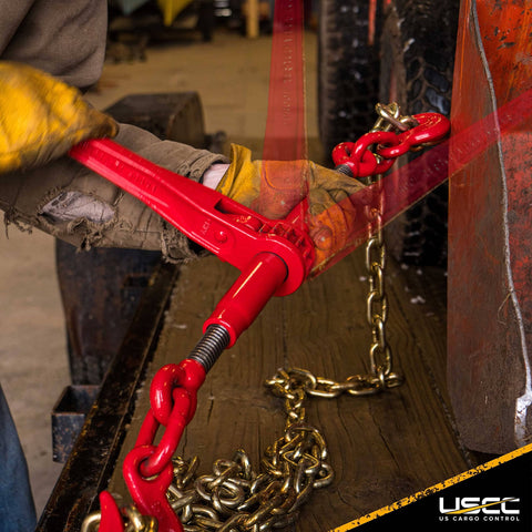 Person using Heavy Duty Two Pack 5/16 Inch Grade 70 Ratchet Load Binders Workhorse Quality With 5400 Lbs Working Load Limit on chains