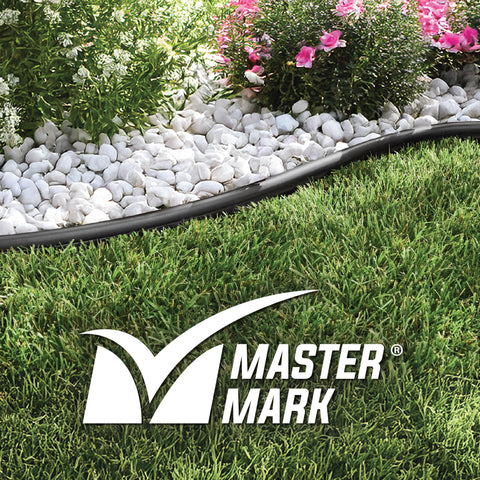 Heavy Duty 40 Foot Landscape Edging Kit With YardPack 5 Inch Flexible Lawn Border outlining a garden bed with flowers