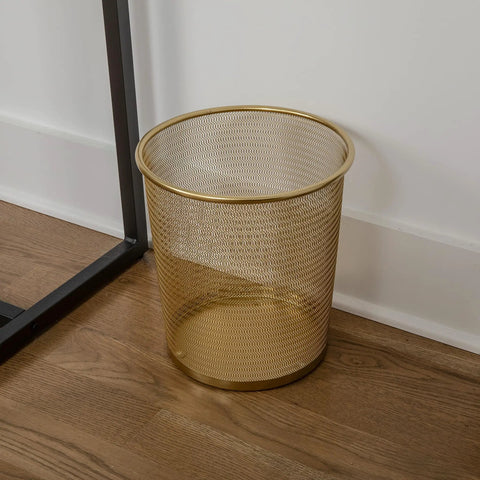 Ryder Gold Mesh Metal Trash Can 4.5 Gallon Office Wastebasket With Non Slip Feet beside desk on wooden floor