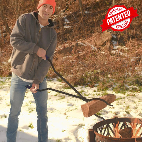 Man using 40 Inch Fire Poker And Log Grabber Set For Fire Pits Must Have Backyard Outdoor Indoor Bonfire Gear Rustproof Two Piece Campfire Tool With Ergonomic Rubber Handles for safe firewood movement in snow.