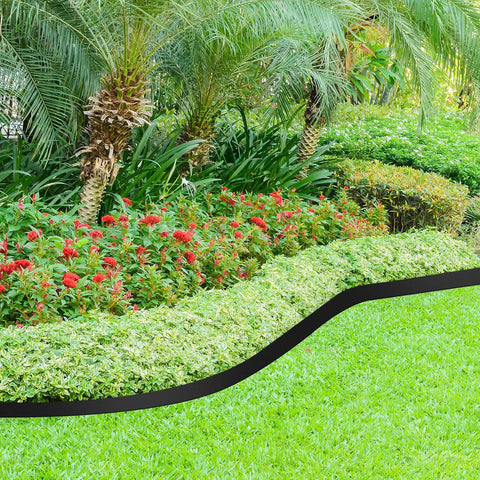 2 Inch Landscape Edging Kit With 3 Rolls Spanning 354 Feet And 324 Anchoring Spikes Flexible Border Edge separating lawn and garden