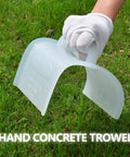 Person holding Heavy Duty Concrete Trowel Tool For Masonry Plastering And Mortar Repair, Plastic Hand Tool For Edging on grass