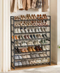 Heavy Duty Metal Shoe Rack Keeps Fifty Pairs Of Kicks Neat Eight Tier Entryway Closet Organizer With Removable Boot Shelf And Matte Black Finish To Slash Floor Clutter And Make Your Space Way Cozier, showcasing shoes on multiple tiers.