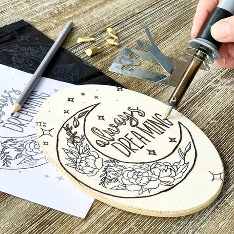 Using Starter Wood Burning Kit With Burner Pen, 5 Interchangeable Tips, 48-Piece Deluxe Pyrography Set on wooden plaque