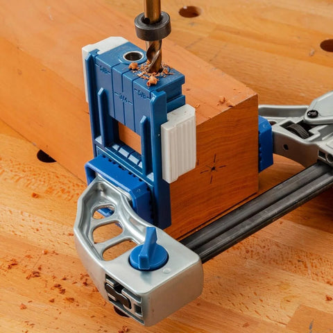 3/8 Inch Doweling Jig Kit With Drill Bit And Stop Collar attached to wood, showing dual edge stops for alignment and durable bushings.