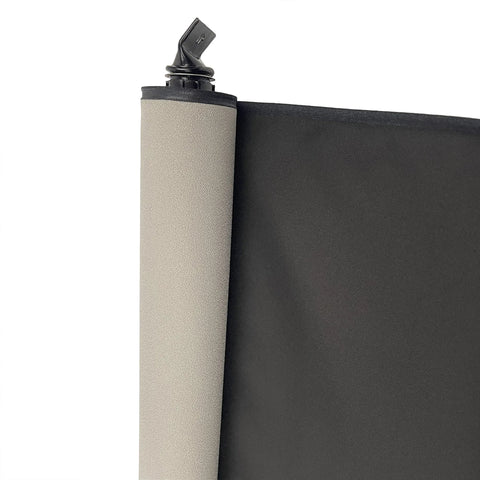 Close-up of beige sunshade roll with black mounting cap for sunroof shade.