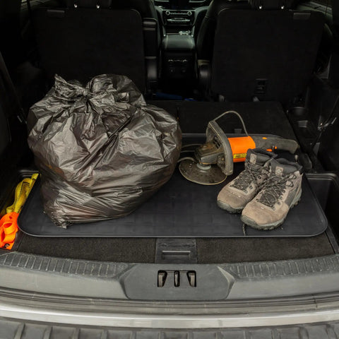 Beefy Extra Large Drip Tray Mat For Garage And Home, Heavy Duty Utility Pan Protects Floors From Spills, Automotive, Pet Food, And Washer Drain Use, 37 By 25 Inches, Black, 2 Pack in car trunk with boots and tools.